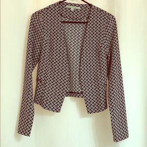 Cute black and white blazer.